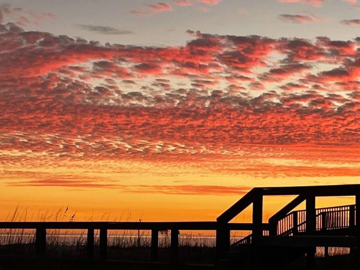 What an amazing experience it is to sit on the back deck overlooking the beach as you enjoy a nice glass of wine taking in the nightly sunset. 